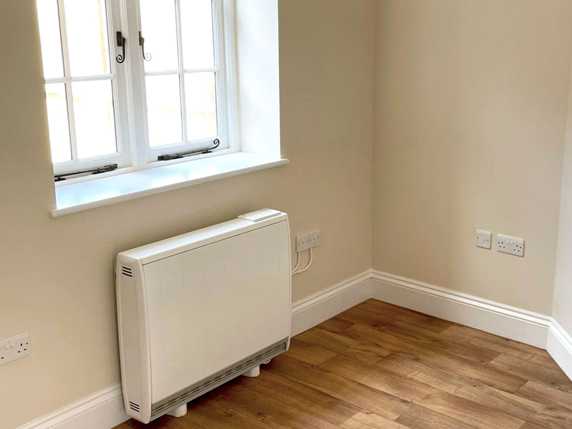 Cranborne house completed room with new wooden flooring and magnolia walls.