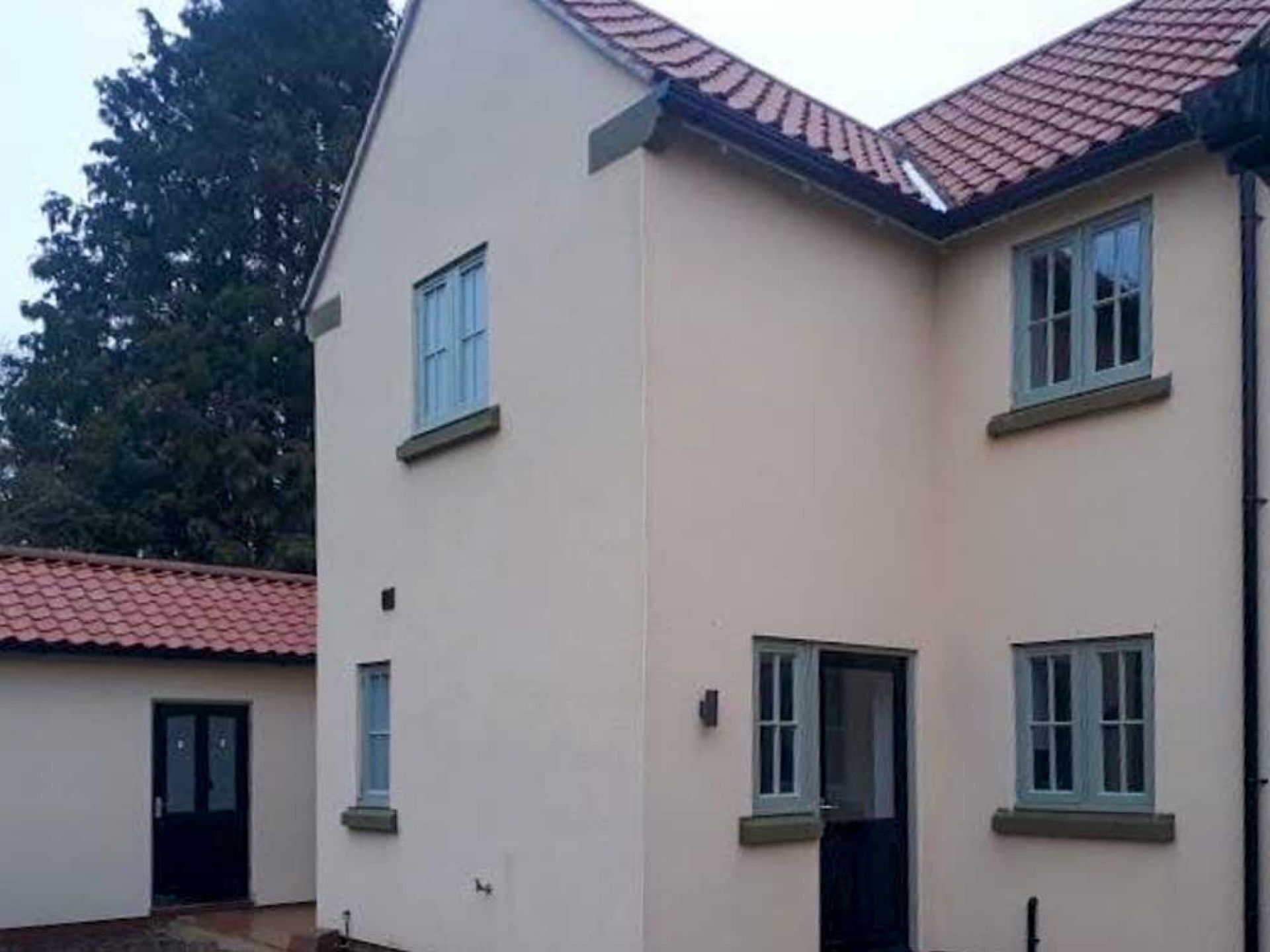 Rear view of new large detached house.