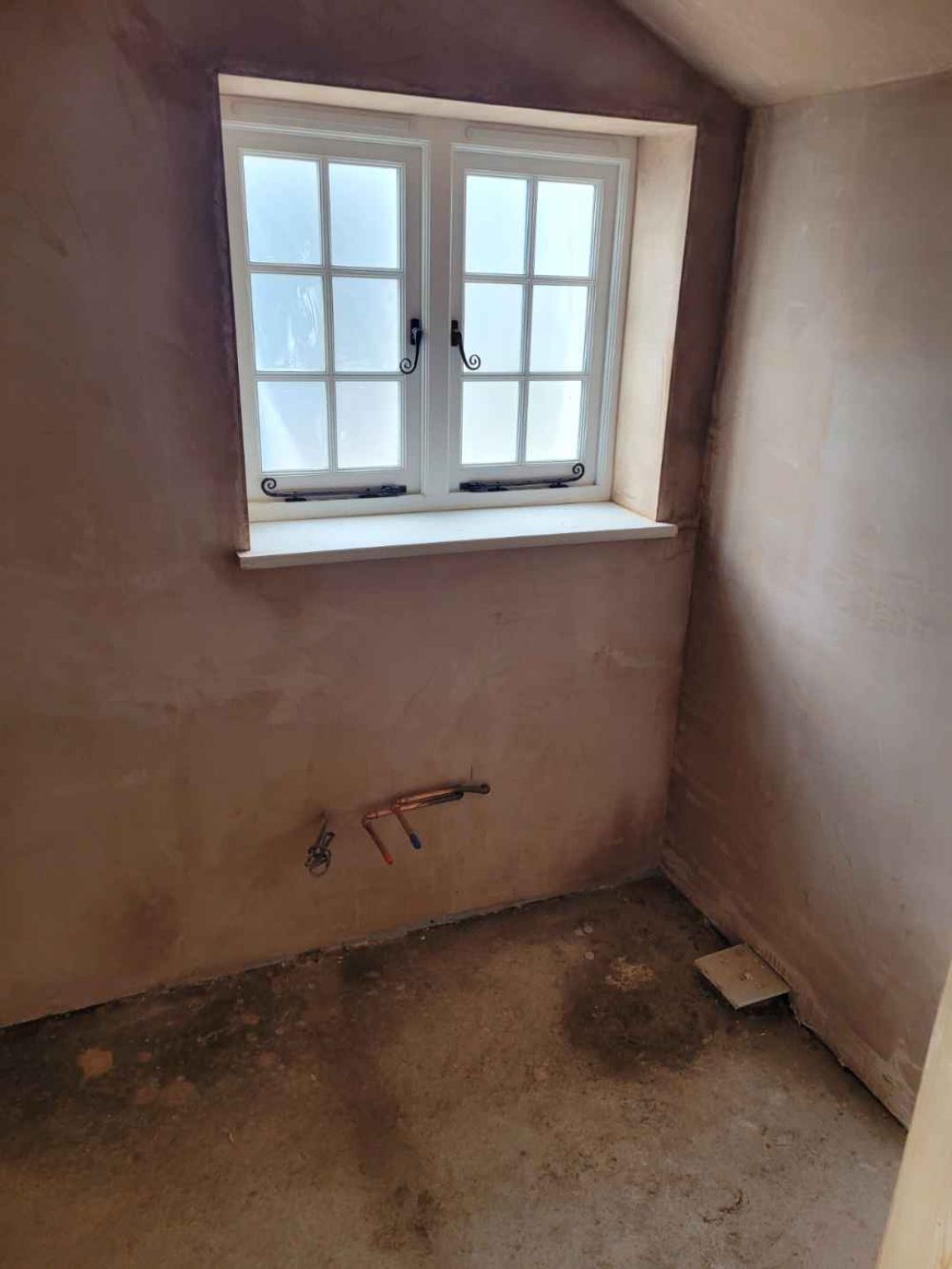 Interior of cranborne house refurbishment with window.