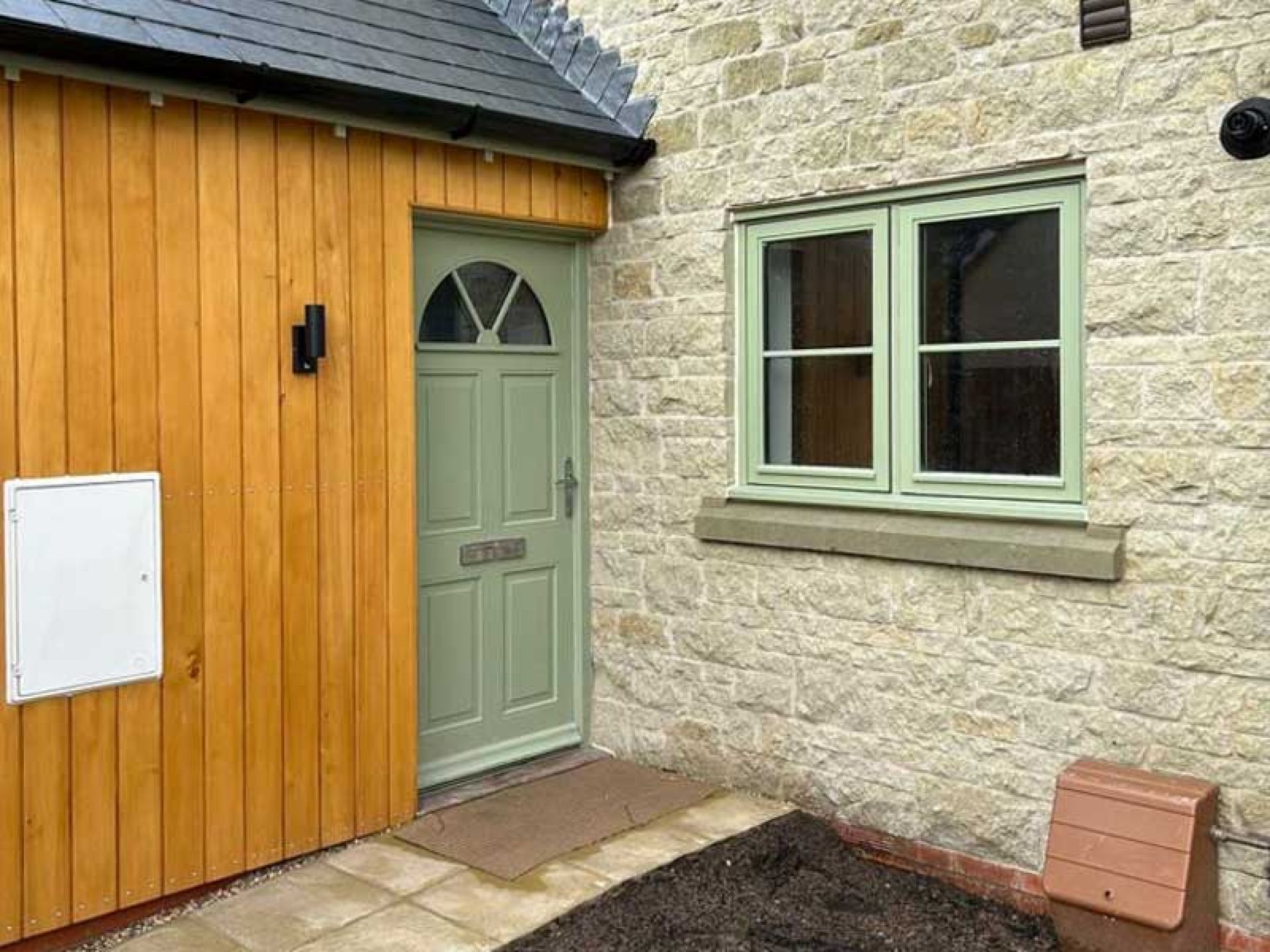 Front door of one of the terraced houses at the Bourton Mill site residential development.
