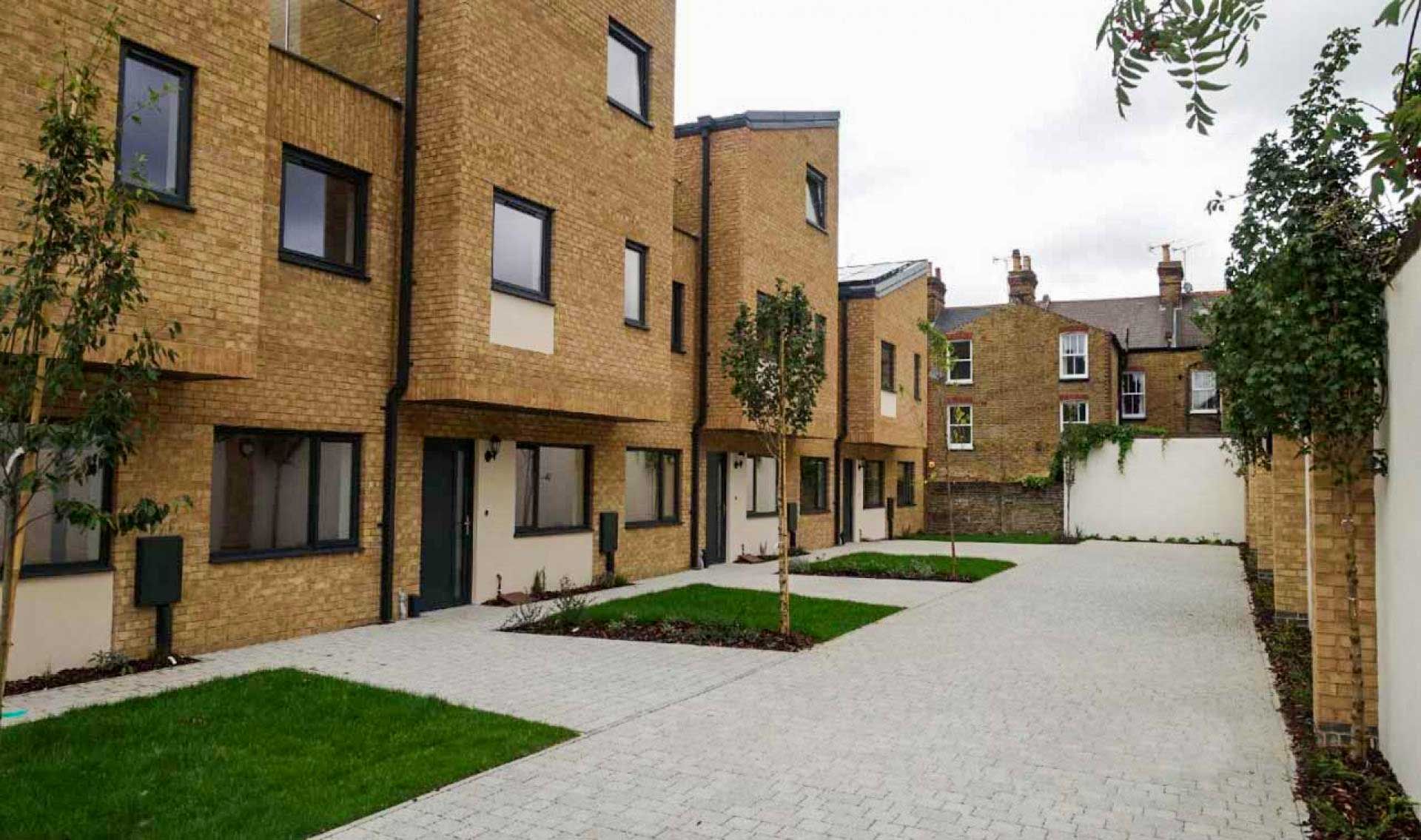 Completed development of five new houses.